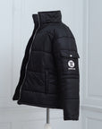 The Signature Huracan Men & Women's Black Puffer Jacket Mannequin side angle