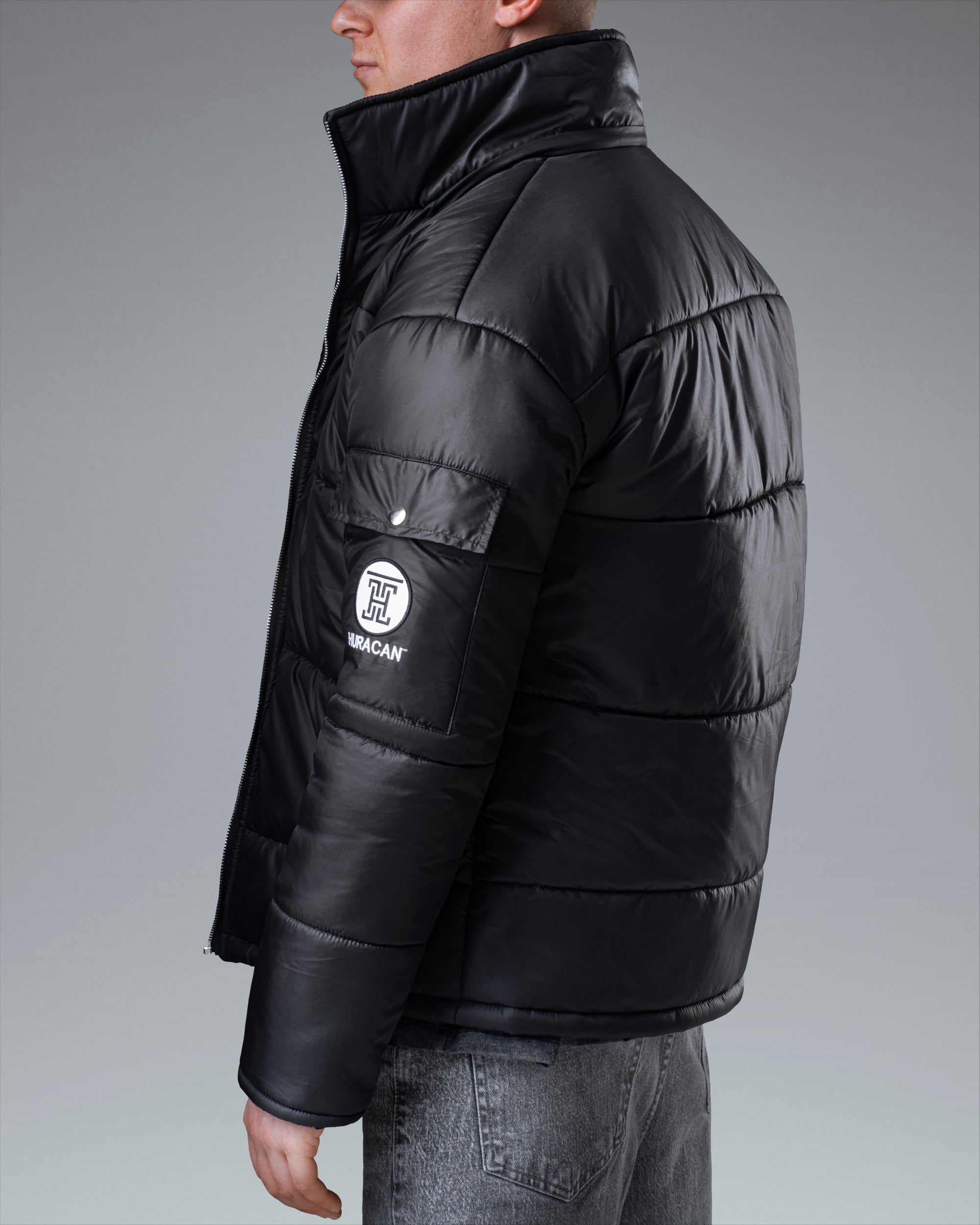 The Signature Huracan Men &amp; Women's Black Puffer Jacket side angle