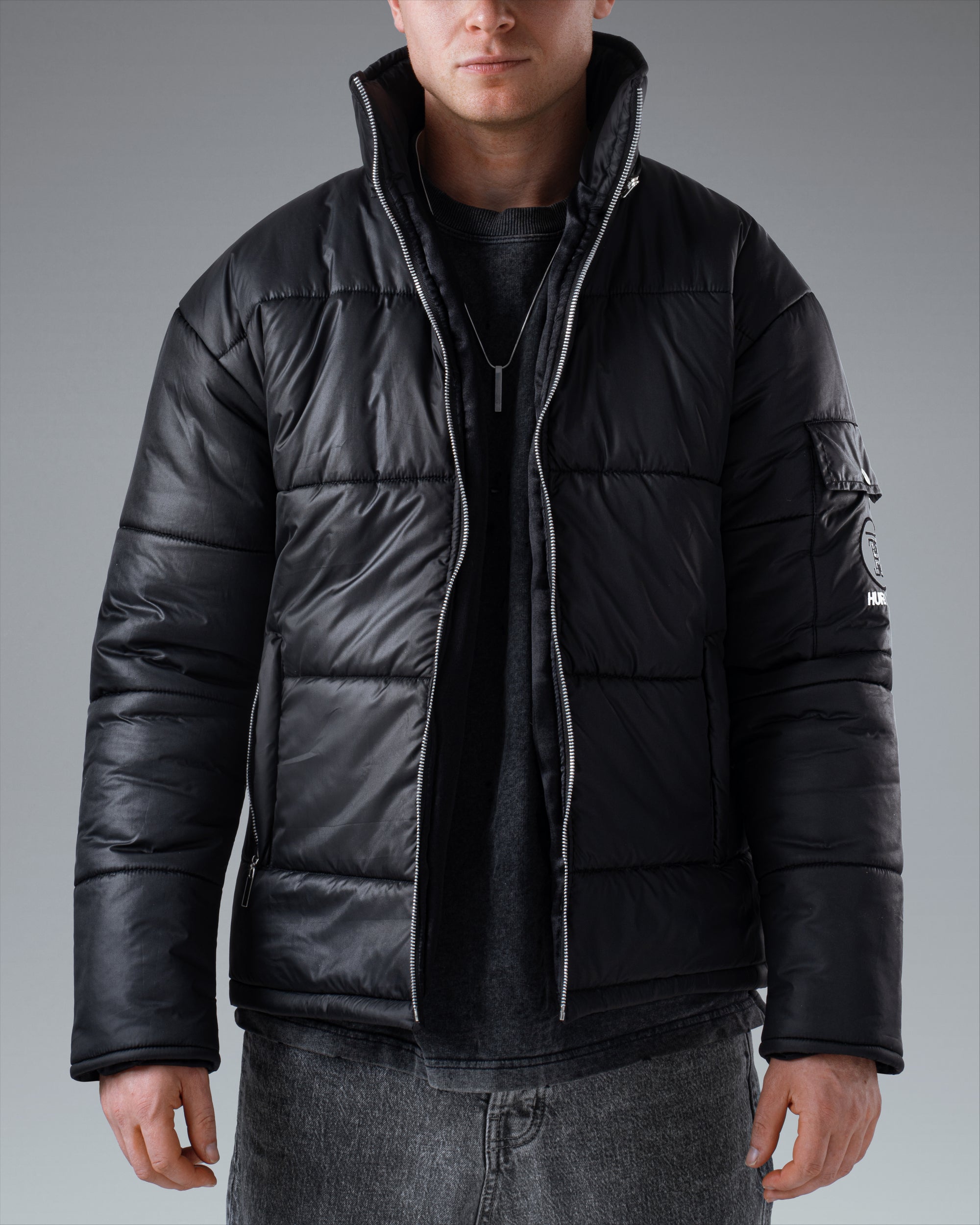The Signature Huracan Men &amp; Women's Black Puffer Jacket front