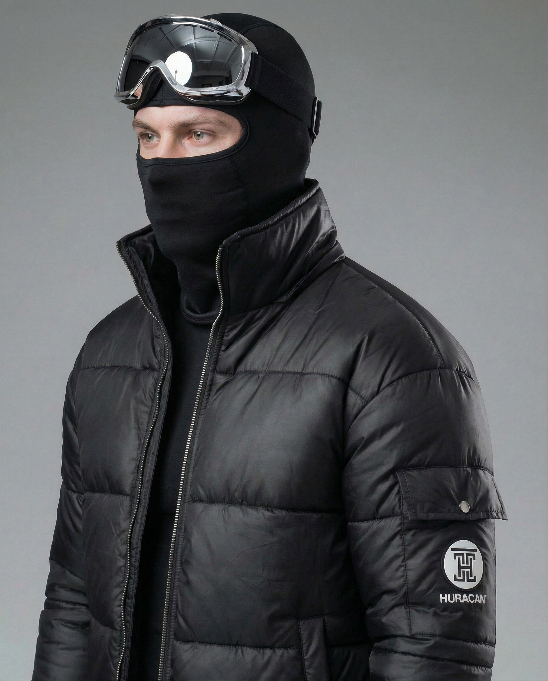 The Signature Huracan Men &amp; Women's Black Puffer Jacket ski image side angle