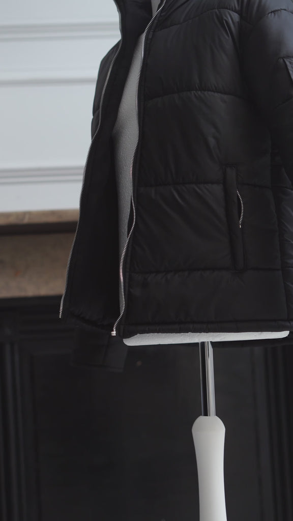 The Signature Huracan Men & Women's Black Puffer Jacket Mannequin video front & back
